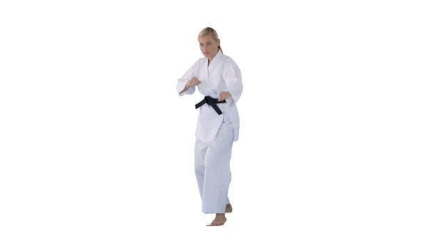 Confident Female Martial Artist in Karate Pose - Download Free Stock Images Pikwizard.com