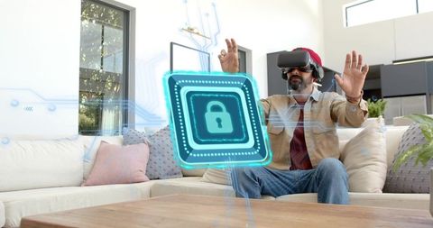 Man Wearing VR Headset Interacting with Holographic Lock on Couch in Modern Living Room
