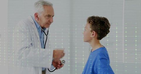 Doctor Examining Child Patient with Medical Technologies