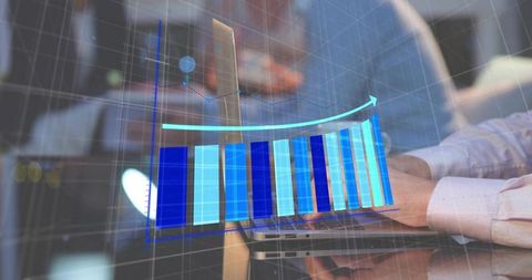 Typing hands on laptop displaying holographic ascending blue bar chart showing growth