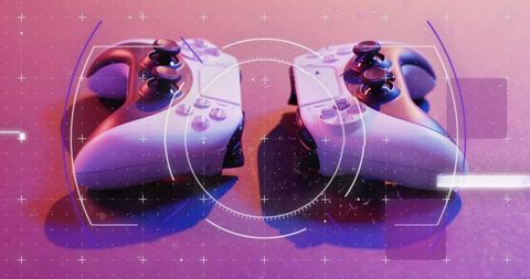 Dual Game Controllers with Futuristic Interface Overlay
