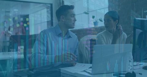 Business Analysts Collaborating in Modern Office with Data Overlays