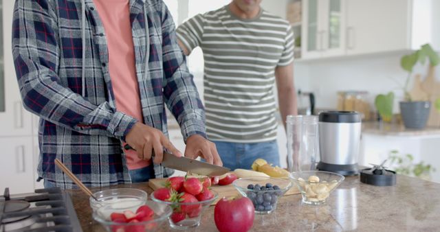 Two People Preparing Fruits in Modern Kitchen for Healthy Smoothie - Download Free Stock Images Pikwizard.com