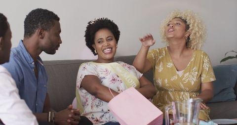 Joyful baby shower gifting among friends