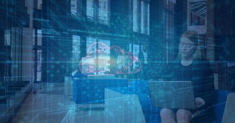 Businesswoman working with laptop and cloud technology overlay in modern office