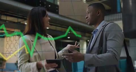 Business Colleagues Discussing Financial Data via Tablet