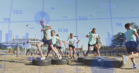 Group Exercise Class Navigating Tire Obstacle Course