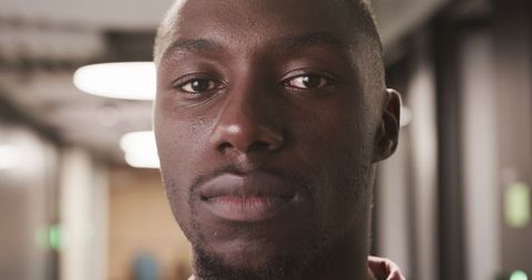 Confident African American Man Standing in Urban Corridor