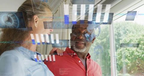 Senior couple embracing smart home future with augmented reality hud overlays