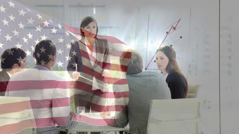 Business Meeting with American Flag Overlay and Success Chart