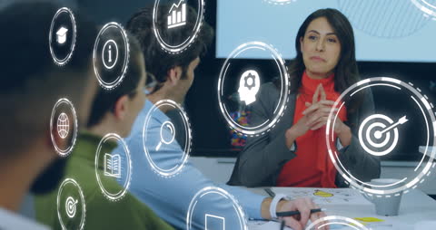 Business Meeting with Futuristic Virtual Icons and Graphs