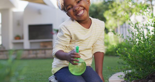 Happy Child Watering Garden Outdoor Relaxation - Download Free Stock Images Pikwizard.com