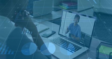 Business Professional Engaging in Virtual Meeting on Laptop