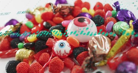 Spooky Eyeball Candy Mix Featuring Colorful Gummies, Wrapped Chocolates, Novelty Sweets
