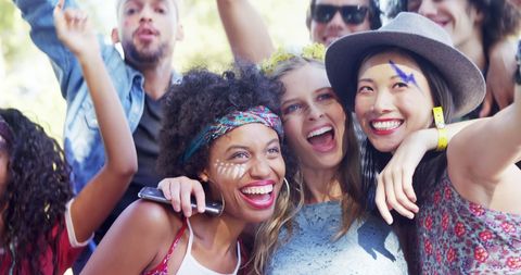 Diverse Friends Celebrating Outdoor Festival in Joyful Spirit - Download Free Stock Images Pikwizard.com