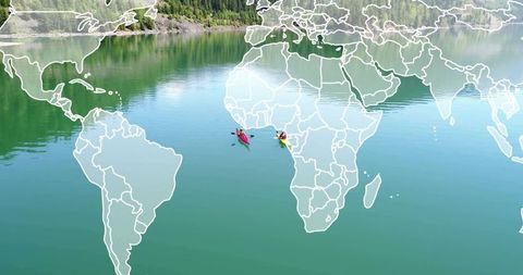 Two Kayakers Paddling on Glassy Green Lake with World Map Overlay and Forest Reflection