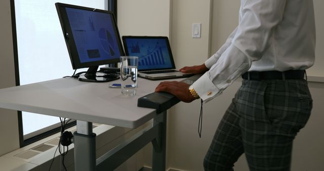 Businessman working on computer in office. Businessman exercising on treadmill 4k