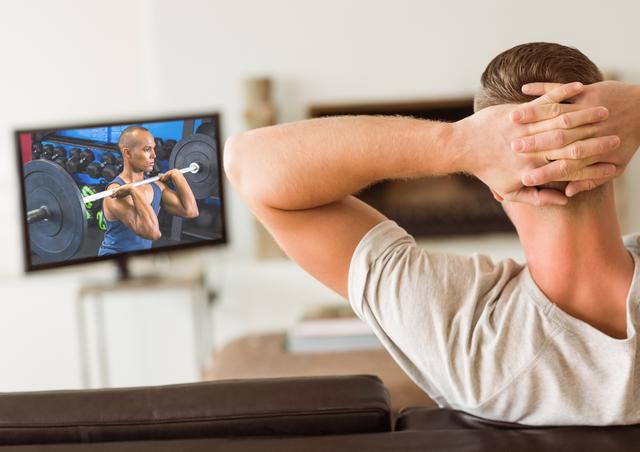 Digital composition of man watching weightlifting competition on TV