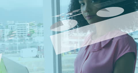 Businesswoman Analyzing Digital Analytics in Modern Office Environment