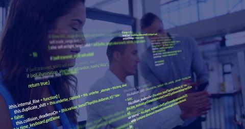 Female developer collaborating with team, coding on screen with code overlay in office