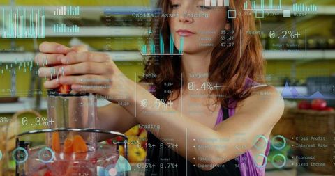 Woman operating blender with augmented reality data overlay in modern home kitchen