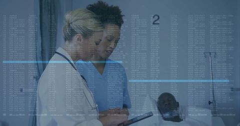Healthcare Professionals Reviewing Digital Patient Data in Modern Hospital