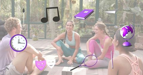 Female Yoga Instructor Leading Lively Community Wellness Class in Sunlit Greenhouse Studio