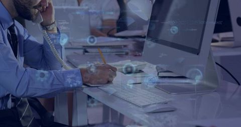 Professional office employee taking phone notes with technological overlay