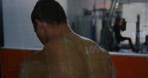 Shirtless athlete lifting weights with performance data overlay