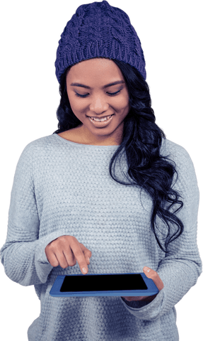 Smiling asian woman in beanie using tablet with transparent background