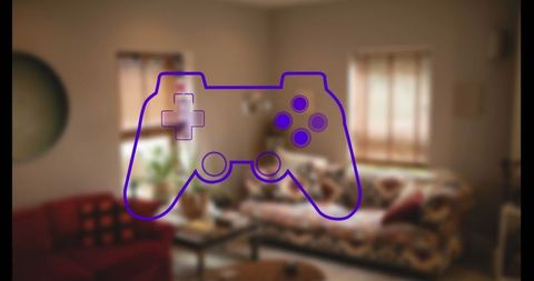 Game controller by cozy living room interior with patterned furniture