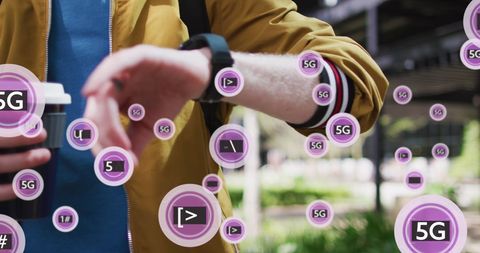 Caucasian man drinking coffee and using smartwatch with 5g concept