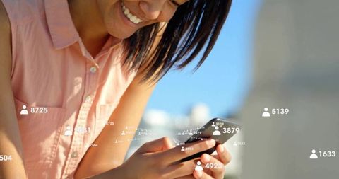 Smiling woman using smartphone with social media follower count overlays