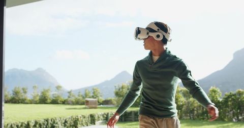 Man Experiencing Vacation from Home with VR Headset