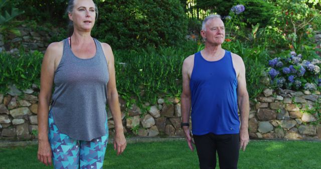 Seniors Engaged in Outdoor Yoga Session in a Garden - Download Free Stock Images Pikwizard.com