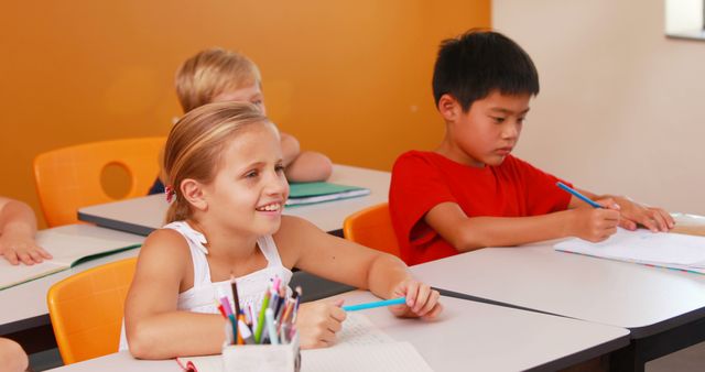 Young Students Attentive and Engaged in Classroom - Download Free Stock Images Pikwizard.com