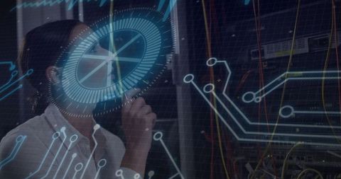 It engineer analyzing data in high-tech data center