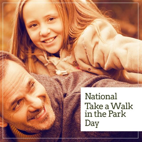 Father and daughter smiling outdoors on walk