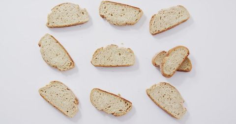 Artistic Arrangement of Bread Slices on White Background - Download Free Stock Images Pikwizard.com