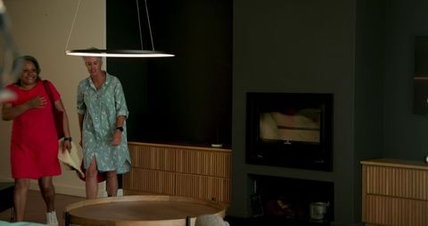 Senior Lesbian Couple Enjoying Hotel Stay