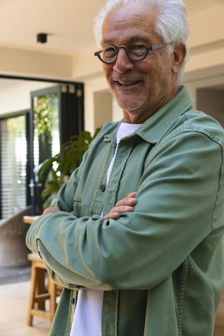 Senior Adult Relaxed at Home in Modern Indoor Setting