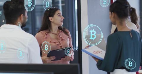 Diverse Colleagues Discussing Blockchain Solutions in Modern Office