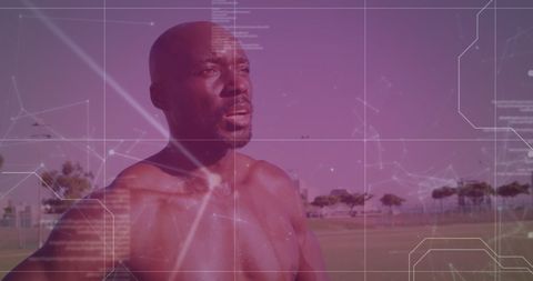 African American Man Exploring Fitness Tech in Outdoor Environment