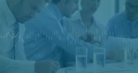 Business Meeting Analyzing Financial Data with Diverse Team