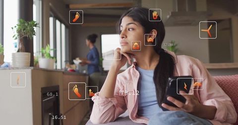 Teenage Girl with Smartphone Relaxing at Home Thinking Nearby Kitchen