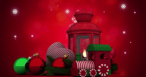 Festive Christmas Decorations with Baubles and Lantern on Red Background