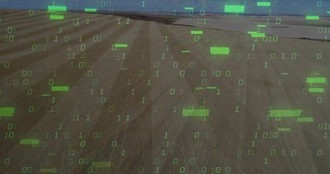 Aerial farmland with neon-green binary data overlay showing precision agriculture insights