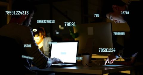 Team Collaboration with Digital Interface Display at Night