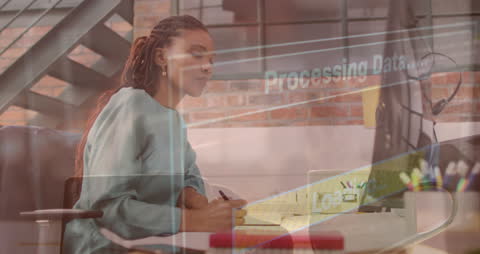 Focus African American Professional Working with Digital Interface