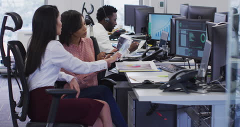 Diverse Colleagues Collaborating in Modern Office Setup